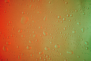 Fototapeta na wymiar water drops on a colorful background