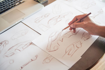 Graphic designer artist Work drawing sketch design development Prototype car Automotive industrial creative visual concept