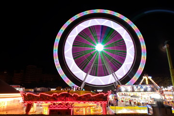 long exposure of a ferris wheel at night