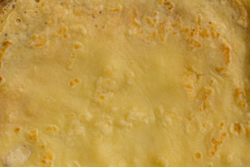 Culinary product. Fried pancakes. The texture of the dough.	