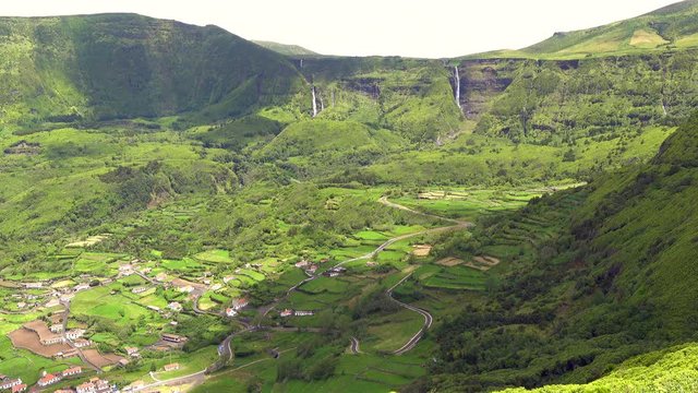 Waterfalls Poco Ribeira do Ferreiro / Alagoinha in the mountains flowing into a lake, Poco das Patas, between Faja Grande and Fajazinha, Island of Flores, Azores, Portugal, Europe, Atlantic Ocean