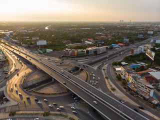 Fototapeta na wymiar Aerial top view circular junction city transport road with car movement