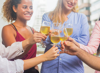 group of young businessmen celebrate business success by drinking wine happily.