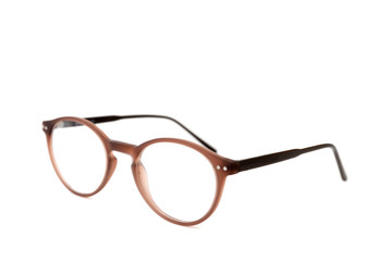 Brown plastic eyeglass frames . Isolated