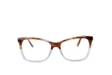 Brown and white plastic eyeglass frames . Isolated