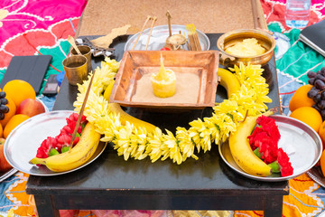 Banana flowers and incense are attributes of a traditional Indian wedding.