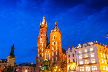Fototapeta na wymiar Main Market Square with Saint Mary's Basilica in Krakow, Poland