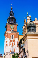 Obraz premium Main Market Square with Town Hall Tower in Krakow, Poland