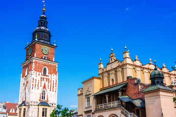 Obraz premium Main Market Square with Town Hall Tower in Krakow, Poland