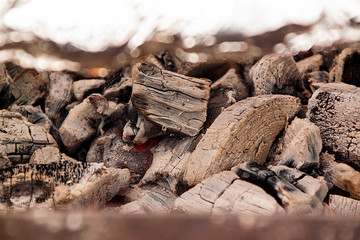 smoldering coals in the grill. background and texture