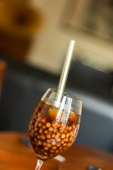 pearl milk tea on glass with stainless steel straw