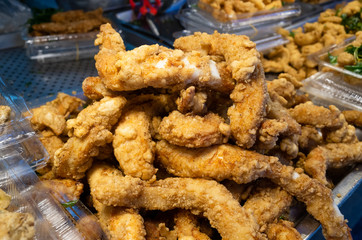 taiwanese fried chicken on a plate in the street