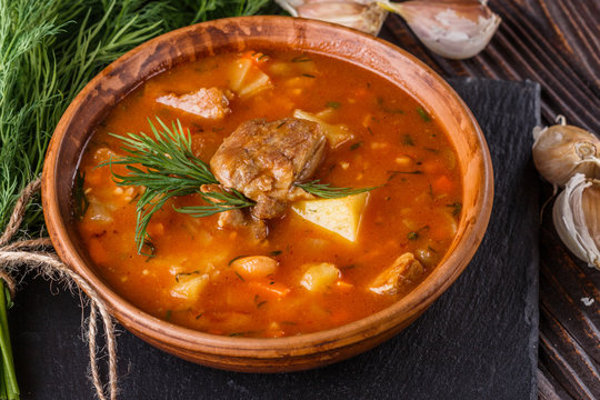 Chanahi a traditional Georgian meat stew in a bowl on stoyn board