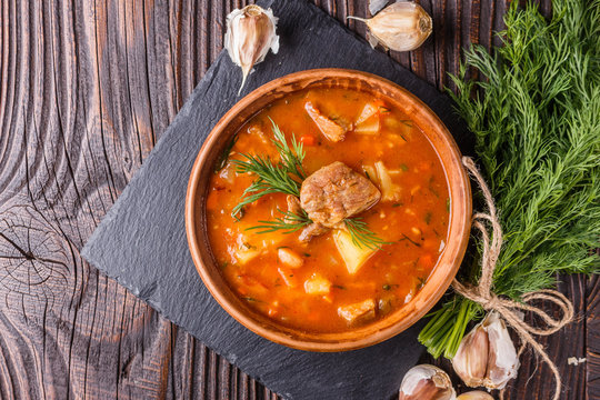 Chanahi a traditional Georgian meat stew in a bowl on stoyn board