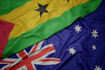 waving colorful flag of australia and national flag of sao tome and principe.