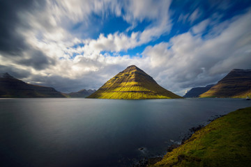 Fototapeta premium The island of Kunoy viewed from city of Klaksvik in the Faroe Islands, Denmark