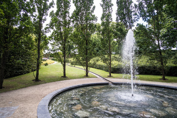 Fountain in The Alnwick Garden, a complex of formal gardens adjacent to Alnwick Castle in the town...