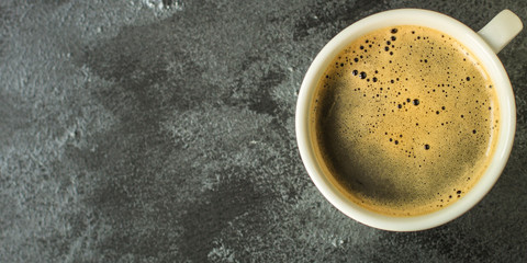 coffee freshly brewed in a white cup serving of beverage (coffee grain). food. top. copy save