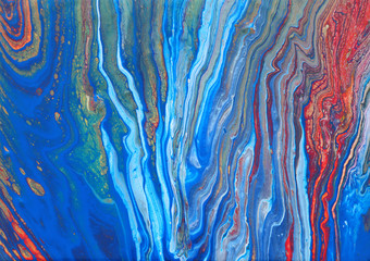 photography of abstract marbleized effect background. Blue, red and white creative colors. Beautiful paint.