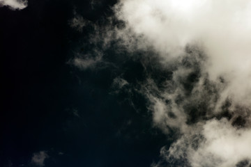 Black sky with white clouds dark mood space art fifty megapixels