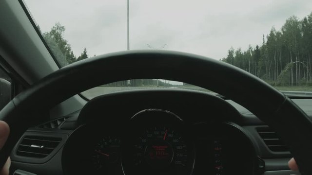 Woman With Steering Whell Driving In Summer Day On Highway.