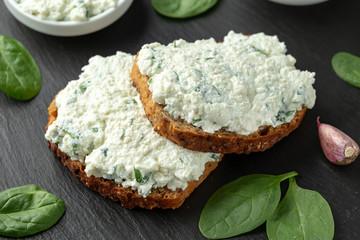 Ricotta cheese spinach sandwich with coffee. healthy breakfast