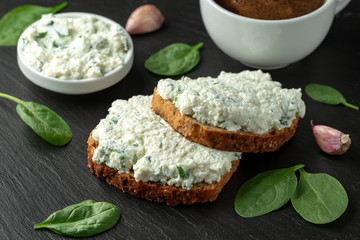 Ricotta cheese spinach sandwich with coffee. healthy breakfast