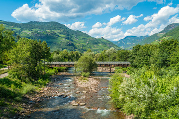 Obraz premium Idyllic mountain panorama in Bolzano from Talvera Bridge, Trentino Alto Adige, Italy.