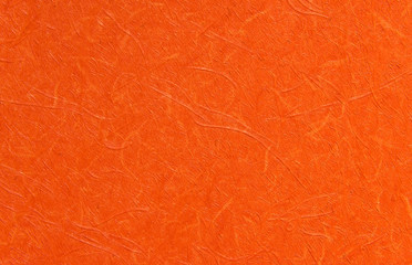 Orange wallpaper with rough surface as background