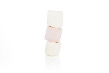 Group of three whole pink and white sweet fluffy marshmallow isolated on white background