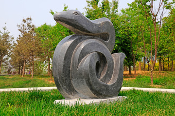 sculpture of the zodiac in the park