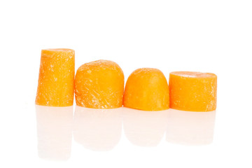 Group of four quarters of stale  orange stale baby carrot baby isolated on white background