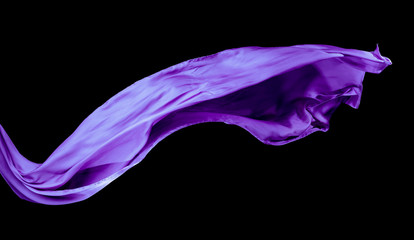 Smooth purple transparent cloth isolated on black background.