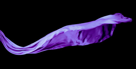 Smooth purple transparent cloth isolated on black background.