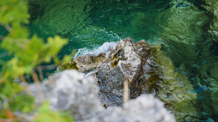 Blue water hitting shore