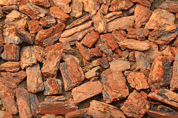 Pine bark fragments stacked together