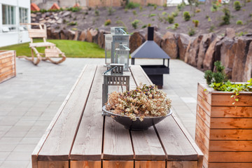 Outdoor restaurant terrace with wooden furniture