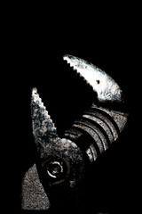 Adjustable gas wrench on a black background