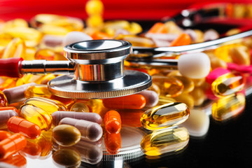 Pills and stethoscope