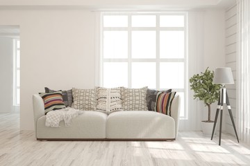 Stylish room in white color with sofa. Scandinavian interior design. 3D illustration