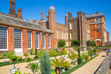 Fototapeta premium London, UK. English garden view and the East Front of Hampton court 17th century locates West London