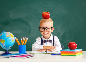 funny child   schoolboy  boy student about school blackboard