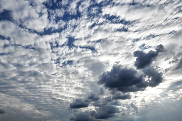 Obraz premium Dark blue sky with clouds for background or texture