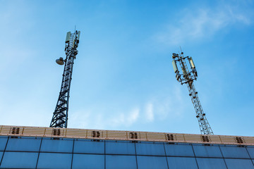 Antenna for wireless communication. Cellular systems in the city. The cell tower with 3G, 4G and...