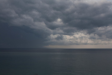 Naklejka na ściany i meble Distant storm off the coast of Sochi, Russia on the Black Sea.