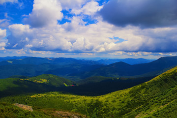 Naklejka na ściany i meble Summer landscape in the Carpathian mountains. View of the mountain peak Hoverla.
