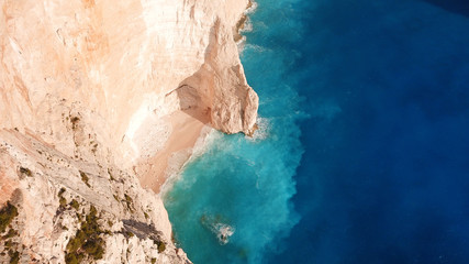 Aerial drone view of iconic beach of Navagio or Shipwreck voted one of the most beautiful beaches...