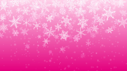 Christmas background of complex blurred and clear falling snowflakes in pink colors with bokeh effect