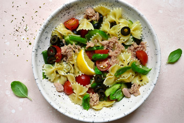Pasta salad with tuna and vegetables. Top view with copy space.