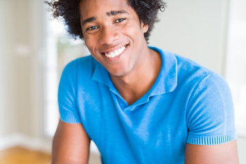 Handsome african american happy man smiling confident